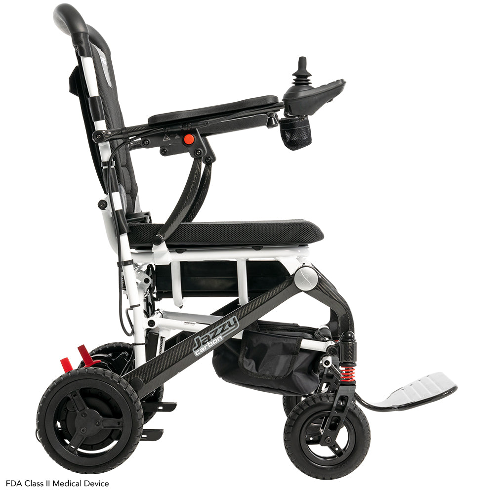 Pride Jazzy Carbon power wheelchair, right side profile view, white