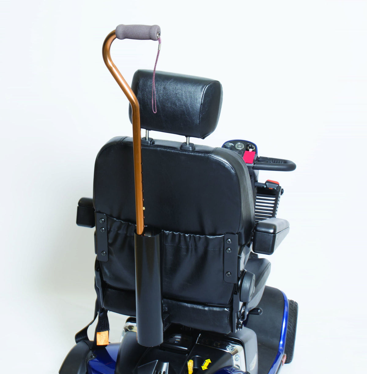 Pride single cane and crutch holder (ACCINDV1058) mounted behind a scooter seat, holding a cane
