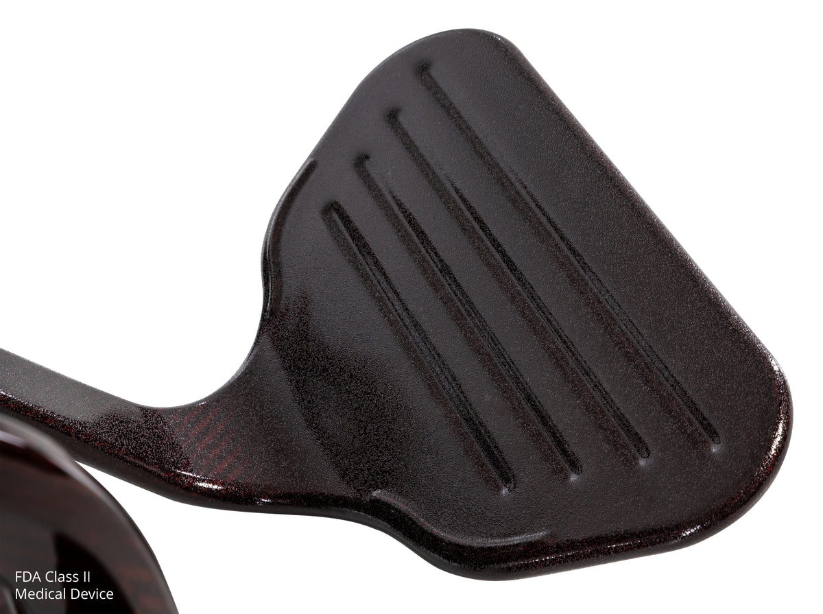 Pride Jazzy Carbon 27 power wheelchair, footplate close-up, black cherry