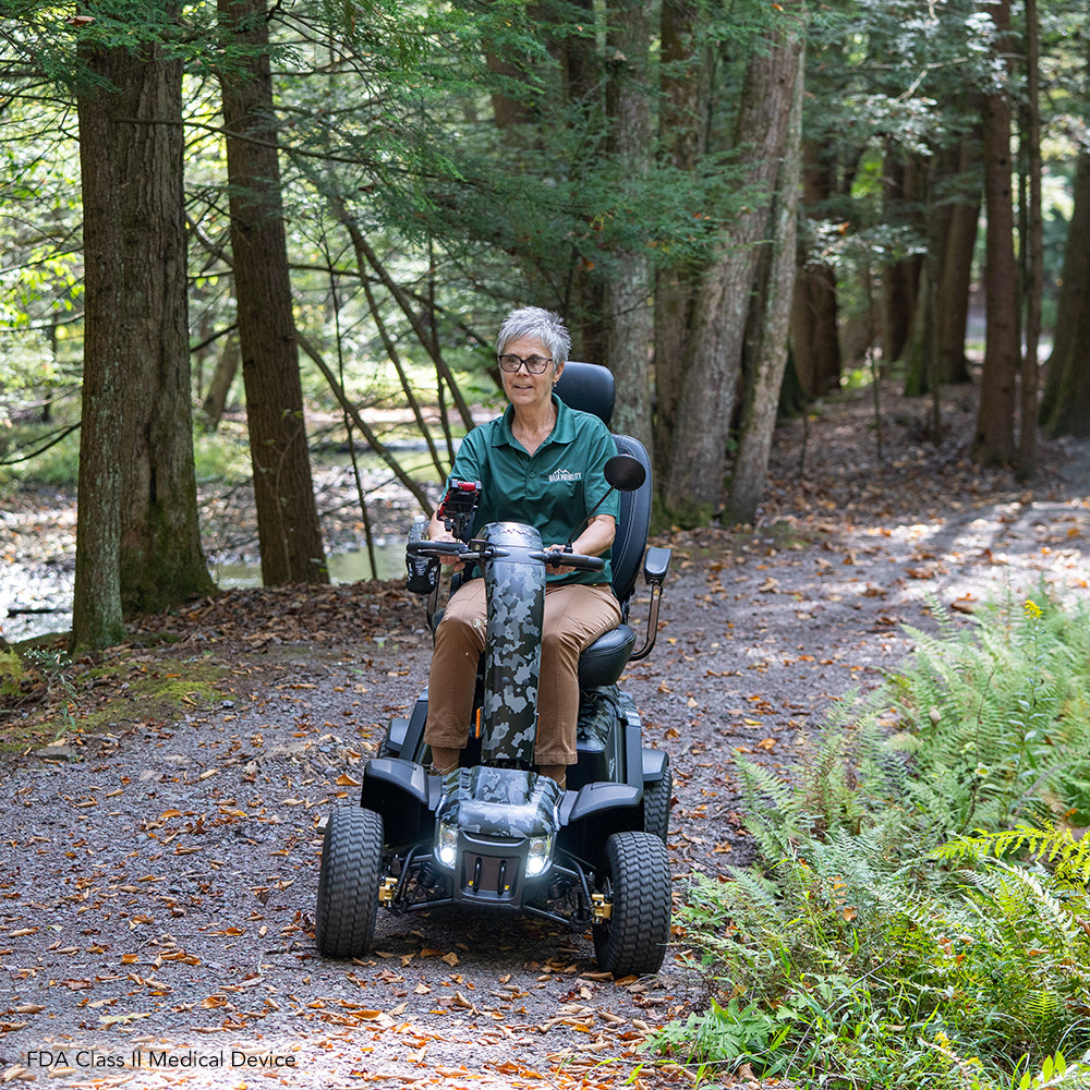 Pride Mobility Baja Wrangler 2 - Rider on Forest Trail (Lifestyle)