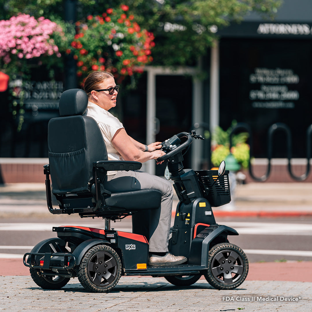 Pride Mobility PX4 - Rider on City Street (Lifestyle)