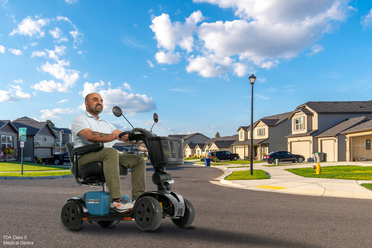 Pride Mobility Victory Platinum 4W (U1) - Rider in Neighborhood (Lifestyle)